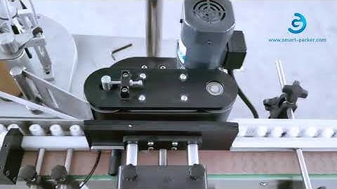 Small round bottle vials horiztonal high speed spacing feeding labeling machine labeling video