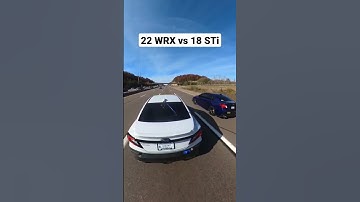22 WRX vs 18 STi (Both stock)