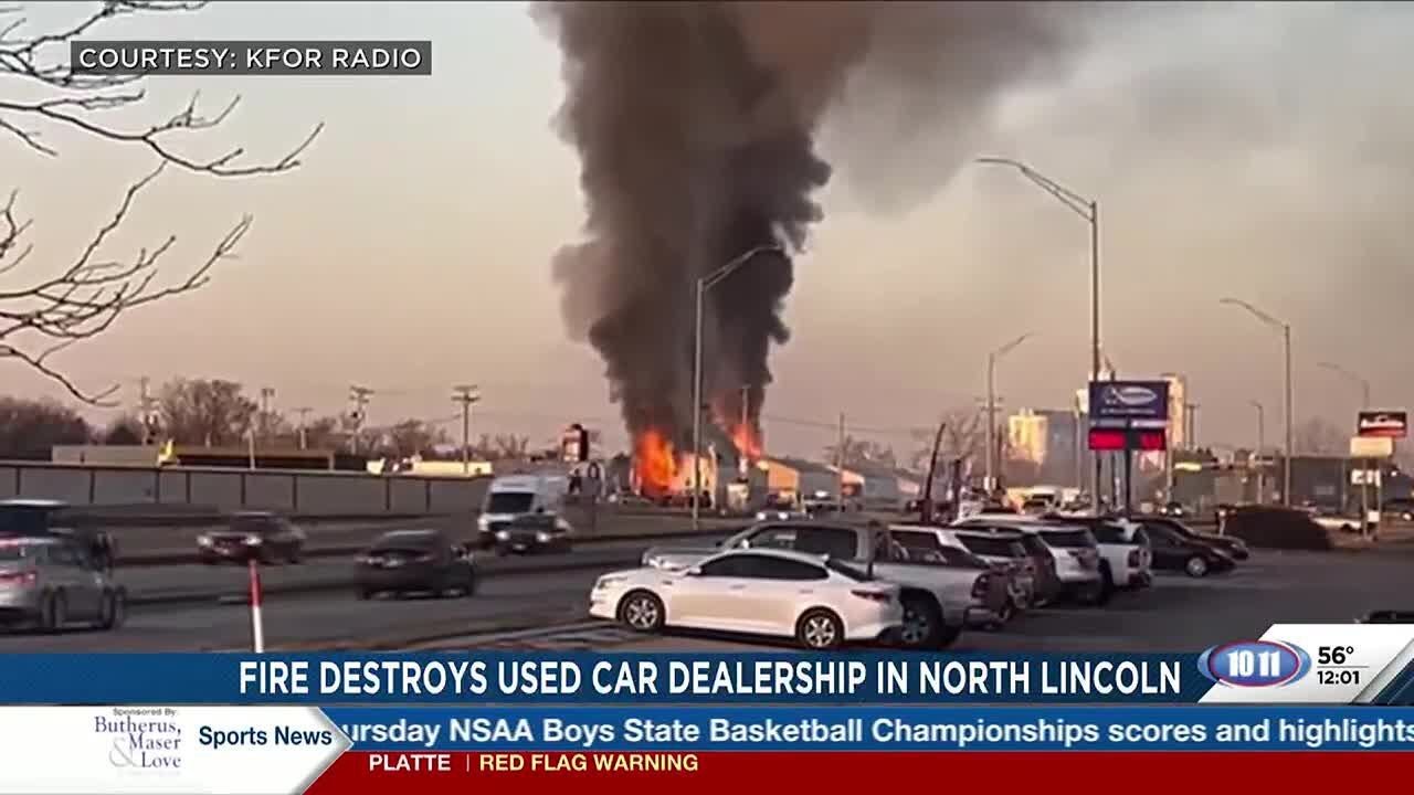 Fire destroys used car dealership in north Lincoln - YouTube