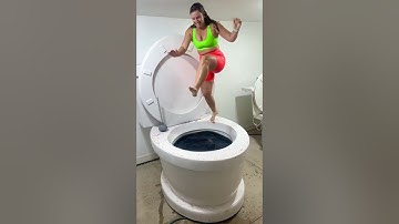 SUPER HIGH JUMP into Worlds Largest Toilet Black Pool in Slow Motion BIG SPLASH #shorts