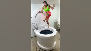 SUPER HIGH JUMP into Worlds Largest Toilet Black Pool in Slow Motion BIG SPLASH #shorts