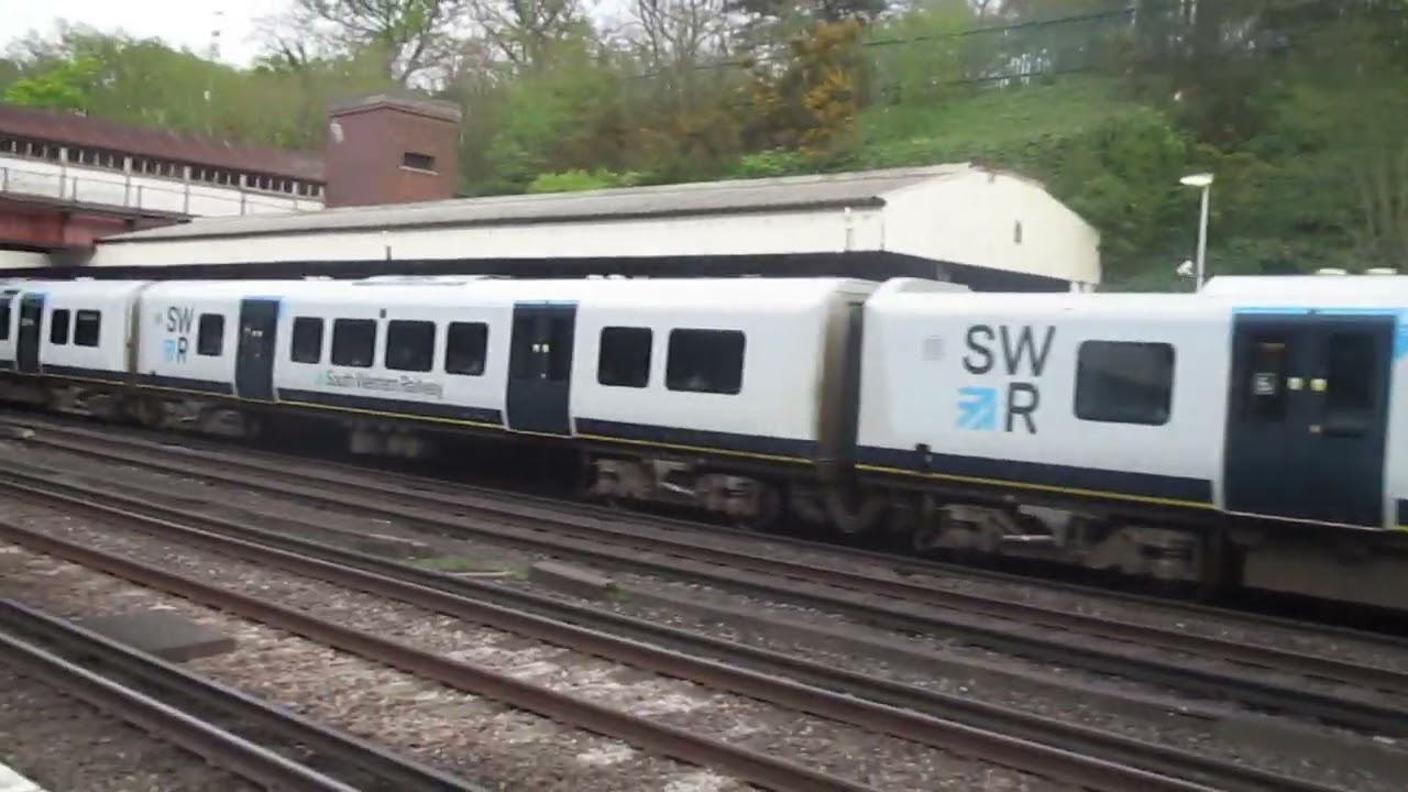 That Is a SWR Train Class 450047 And 450052 In Weybridge