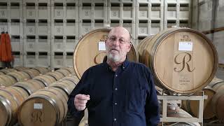 Why do most red wines undergo malolactic fermentation?