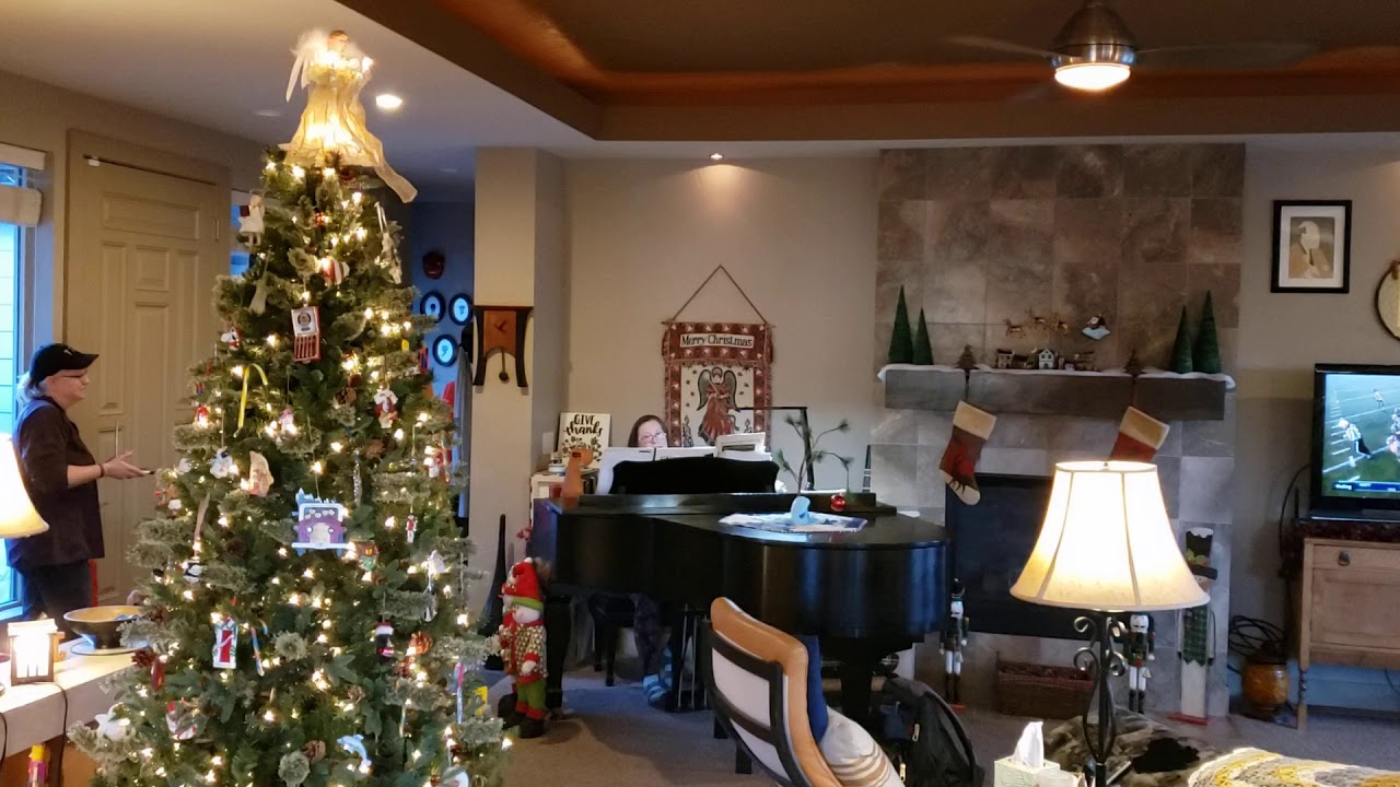 Deb Naga5 plays Silent Night for TAMs.