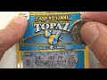 Scratching an Instant Scratch Off Lottery Ticket called "Topaz 7s" -  Australian Lotteries