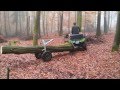 ATV mit Rückewagen für Stammholz im Buchenwald
