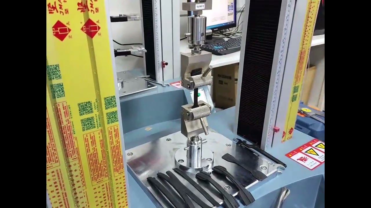 Universal tensile testing machine for testing rubber