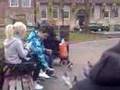 Ubaid and Aziz feeding pigeons