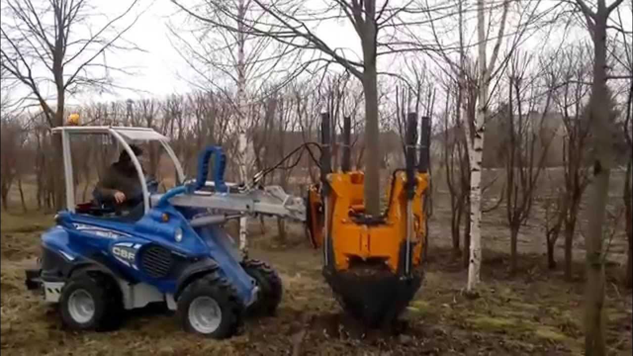 Машина для выкапывания деревьев с комом земли
