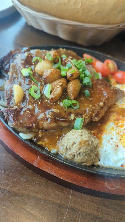 For Banh Mi Chao (Sizzling Plate) and Vietnamese Coffee, here's NEP Cafe in Fountain Valley, CA