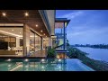 Ultra tropical modern house  in bandung by rakta studio with dna helix stair illuminated glass step