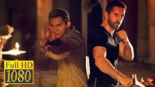 Tony Jaa vs Scott Adkins in the movie Triple Threat (2019)