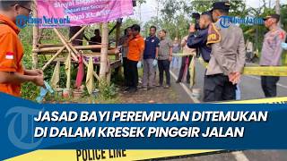 A BABY'S BODY IN A BAG WAS FOUND BY RESIDENTS ON THE BEACH OF A ROAD IN BONDOWOSO