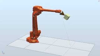 RobotStudio simulation showing an object being attached to rotating device