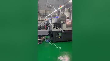 Mechanical Barfeeder working with Tsugami CNC lathe