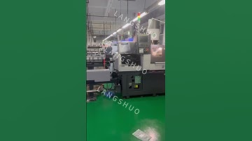 Mechanical Barfeeder working with Tsugami CNC lathe