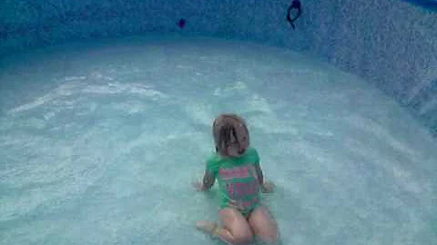 Tasha playing in swimming pool