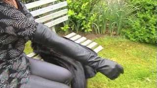 Putting on extra long leathergloves