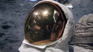 Close-up View of Buzz Aldrin's Helmet, Gloves, and Checklist from Apollo 11 in 4k