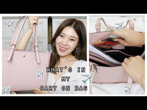 What's in my carry on bag จัดกระเป๋าขึ้นเครื่องบินยังไง พกอะไรไปบ้าง║Evefee