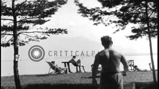 Allied Soldiers Sun Bathe At A Rest Camp In Gstadt, Germany During World War Ii. Hd Stock Footage