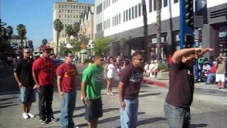 USC and Long Beach Lambda Theta Phi brothers saluting at Latino Parade sept. 2009