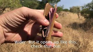 Leather Card Wallet With Zebras in Rwanda. A short description of how it works.