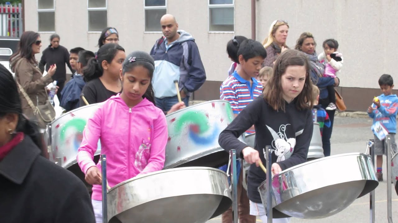 H playing steel pans YouTube