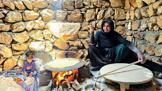Nomadic woman baking traditional bread on a fire in the mountains🔥🏔️ | Iranian nomadic lifestyle 🫓