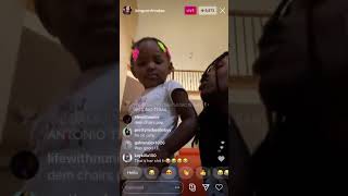 King von daughter listening to music