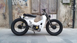 Check out this awesome custom Repsol Honda C90 Cub  BeMoto