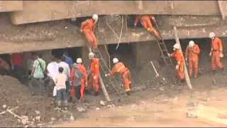 China mudslide toll passes 700