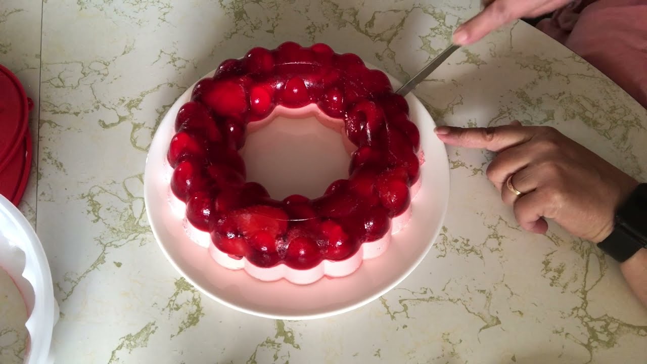 Strawberries and Jello in a Tupperware mold #jello #tupperware 