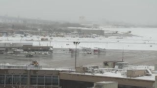 Crews work to clear snow from Philadelphia airport tarmac