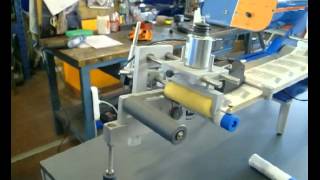 labeling machine to apply wraparound label on CYLINDRICAL TUBE.5.avi