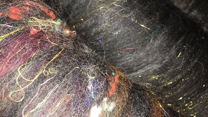 Jazzy batts for spinning from wool waste
