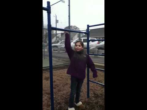 How to sit on the monkey bars and do a front and back flip