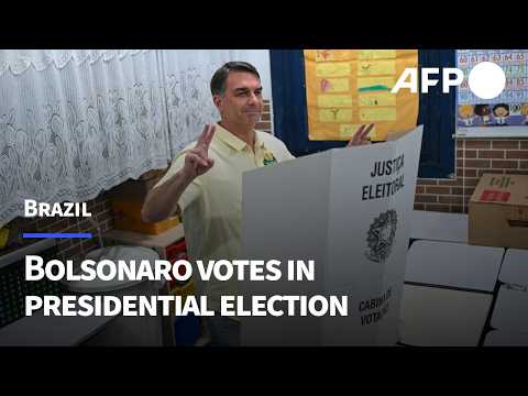 Flavio Bolsonaro casts vote in tightly-fought Brazil elections | AFP