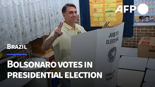 Flavio Bolsonaro casts vote in tightly-fought Brazil elections | AFP