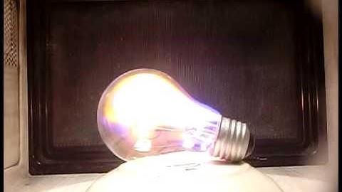 Slow Motion In The Microwave - A Clear Light Bulb