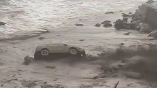 LAFD firefighter recalls escaping car swept into ocean by mudslide
