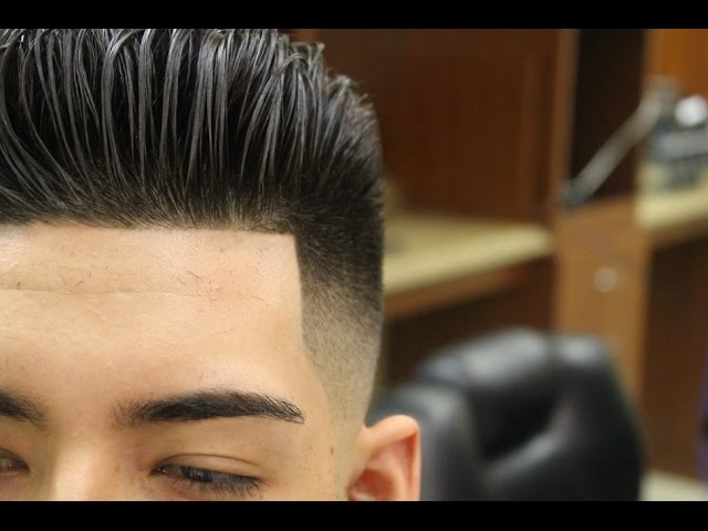 Slicked Back Pompadour with Bald Fade; pomp; scissor haircut; razor fade