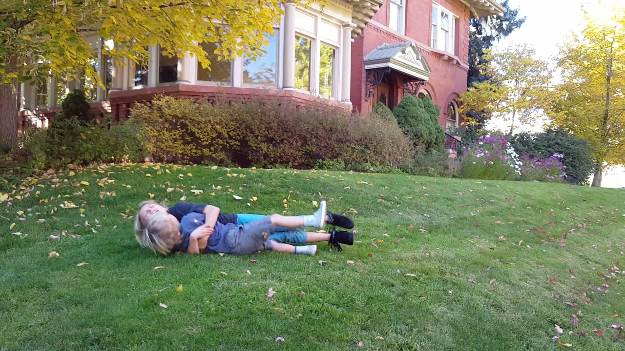 Kids rolling down the hill YouTube