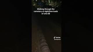 Walking through the cemetery at night 
