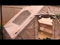 Tent spray test in progress.