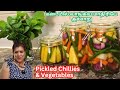        tasty pickled mangoes chillies  vegetables