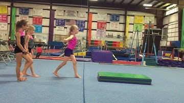 Xcel Bronze Team Learning How to do Switch Leaps