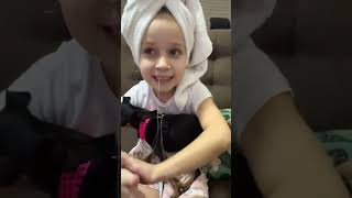 Helpful Puppy Grabs Girl’s Loose Tooth Using a Dental Floss