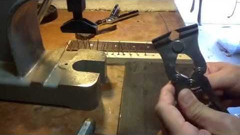 Installing fretwire on a bound fretboard