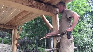 Chinking the Earth Lodge with Moss